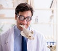 Funny crazy professor studying animal skeletons