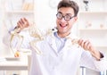 Funny crazy student doctor studying animal skeleton Royalty Free Stock Photo