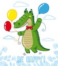 Funny crocodile with balloons