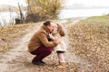 Funny curly girl kisses dad