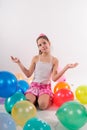 Funny cute little girl with baloons Royalty Free Stock Photo