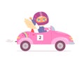 Funny cute little girl in safety helmet driving speed toy pink car and waving to fans Royalty Free Stock Photo