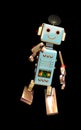 Funny cute robot toy on black Royalty Free Stock Photo