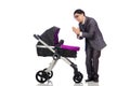 The funny dad with baby and pram on white Royalty Free Stock Photo