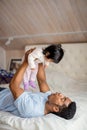 Funny daddy having a fun with his little adorable daughter Royalty Free Stock Photo