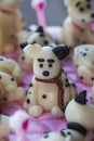 Funny Dalmatian puppies of marzipan on the cake