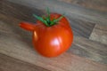 Funny deformed red tomato with a nose Royalty Free Stock Photo