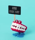 Funny denture and text april fools day Royalty Free Stock Photo