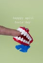 Funny denture and text happy april fools day Royalty Free Stock Photo