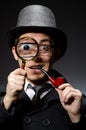 Funny detective with pipe Royalty Free Stock Photo