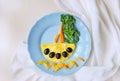 Funny dish for Kids. Omelette with vegetables. Creative idea of breakfast. Restaurant menu. Food art.