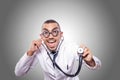 Funny doctor isolated on the white Royalty Free Stock Photo