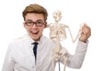 Funny doctor with skeleton isolated on white Royalty Free Stock Photo