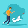 Funny dog and frisbee. Young man is playing with his dog. Dog jumping to catch the flying disc. Royalty Free Stock Photo