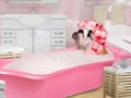 Funny Dog in pink curlers sitting in the bath with foam Royalty Free Stock Photo