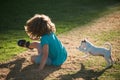 Funny doggy game. Child boy enjoying with her best friend dog. Kids playing with his pet dog. Royalty Free Stock Photo