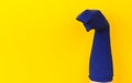 Funny doll sock on yelow background, hand theater - Image Royalty Free Stock Photo
