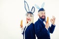 Funny easter bunny. Funny couple in banny ears. Happy easter and funny easter day. Bunny rabbit ears costume.