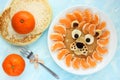 Funny edible lion mandarin tangerine pancakes