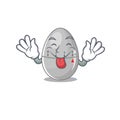 Funny egg kitchen timer cartoon design with tongue out face Royalty Free Stock Photo
