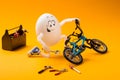 Funny egg repairing bike with tools