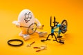 Funny egg repairing wheel of bike
