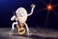 Funny egg rocker guitarist Royalty Free Stock Photo