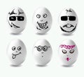 Funny eggs. This is image of funny eggs on white background. Faces on the eggs. Funny easter eggs Royalty Free Stock Photo