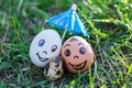 Funny eggs imitate smiling mixed couple with versicolored baby Royalty Free Stock Photo