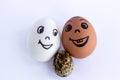 Funny eggs imitating a happy mixed couple with multicolored baby