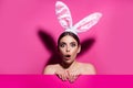 Funny emotions, excited expressing. Bunny woman on pink.