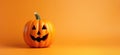 Funny evil pumpkin smiling on orange background