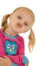 Funny expression of a girl puckering her lips Royalty Free Stock Photo