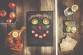 Funny face arranged from linseed, kiwi and strawberry on black s Royalty Free Stock Photo