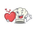 Funny Face cook hat cartoon character holding a heart