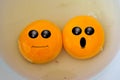Funny face on egg yolk