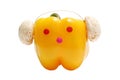 Funny face with headphones from yellow paprika Royalty Free Stock Photo