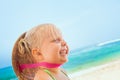 Funny face portrait of happy child in vietnamese straw hat Royalty Free Stock Photo