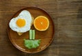 Funny face serving breakfast, fried egg, toast Royalty Free Stock Photo