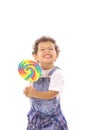 Funny face toddler with big lollipop Royalty Free Stock Photo