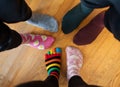 Funny family legs in mismatched socks Royalty Free Stock Photo