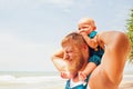 Funny family photo. Baby son sit on father shoulders. Royalty Free Stock Photo