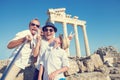 Funny family take a selfie photo on Apollo Temple colonnade view Royalty Free Stock Photo