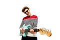 Funny fashion man playing on the guitar