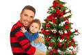 Funny father and his son near Xmas tree