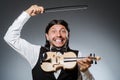 Funny fiddle violin player Royalty Free Stock Photo