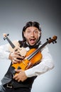 Funny fiddle violin player Royalty Free Stock Photo