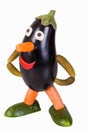Funny figure carved out of an eggplant Royalty Free Stock Photo