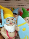 Funny figures of garden gnomes on sale in the store Royalty Free Stock Photo