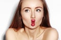 Funny Fish Lips Face with Exprissive Emotions. Beautiful Model Girl with Makeup, Red Lip, Perfect Skin. Fishlips